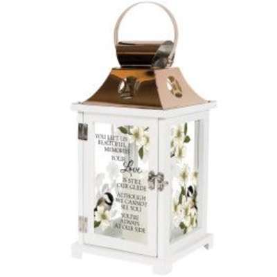 White memorial lantern with gold top, printed white blossoms, bird art, and sympathy verse on glass panels.
