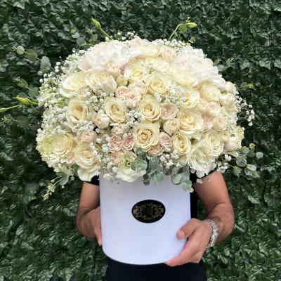 Large cream rose bouquet in a white hat box
