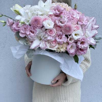 Large pink and white bouquet in a white hatbox