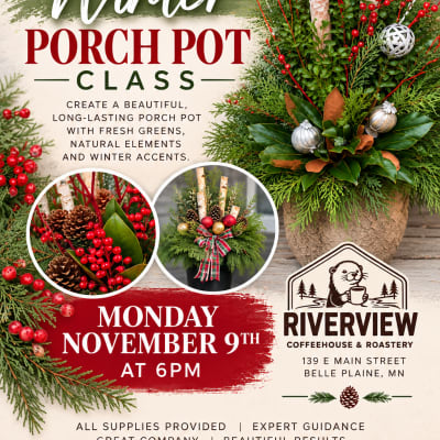 Winter porch pot with birch branches, red berries, and evergreen accents in a textured planter
