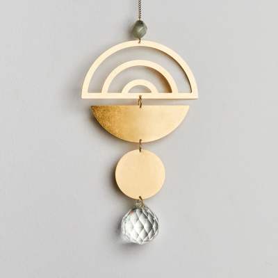 Geometric gold metal hanging ornament with clear faceted crystal drop