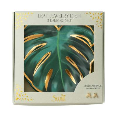 Leaf-shaped jewelry dish with gold accents and small gold stud earrings in a gift box