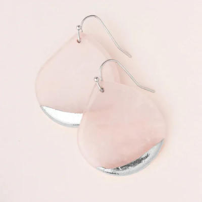 Pair of pink teardrop earrings with silver-tone tips on a pale background