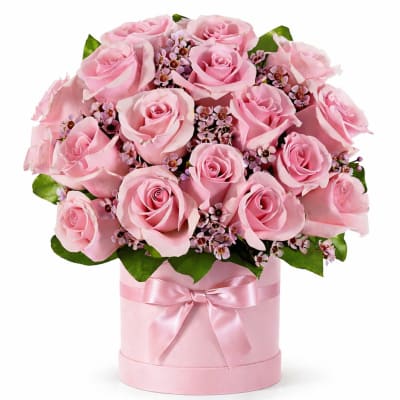 Pink rose bouquet in a round pink box with a satin ribbon