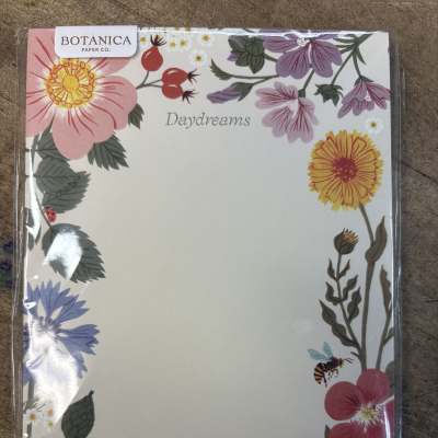 Floral stationery pad with pink, yellow, and purple flowers and butterflies
