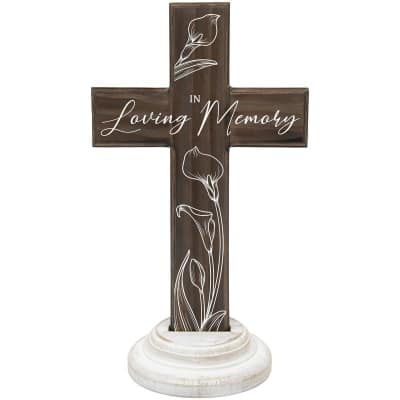 Wood-look cross on a white pedestal base with calla lily outlines and the words In Loving Memory.