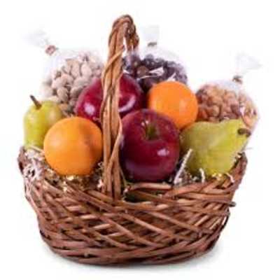 Wicker basket filled with assorted fruit and nuts