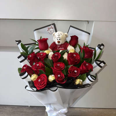 Red roses, teddy bear, Ferrero chocolates