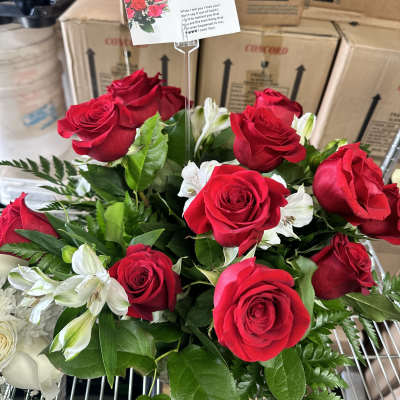 Red roses with white alstroemeria in a bouquet