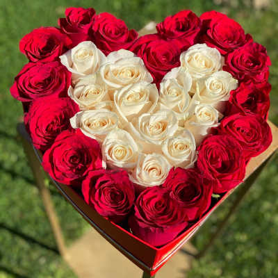 Heart-shaped box of red and white roses