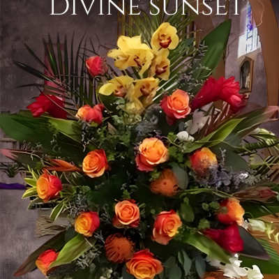 Tall floral spray with orange roses, yellow orchids, and red blooms