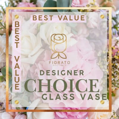 Designer choice bouquet in a glass vase with pink and white flowers