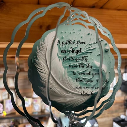 Teal memorial balloon with feather design and printed sympathy message
