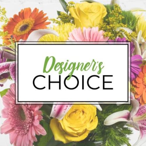 Colorful mixed flower arrangement with a "Designer’s Choice" sign