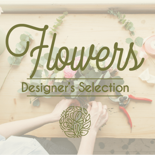 Floral design workspace with a bouquet and the words "Flowers Designer's Selection"