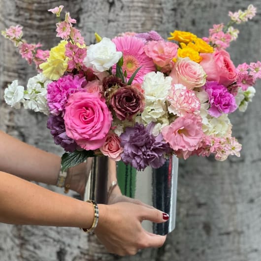 Mixed pink and white bouquet in a silver vase