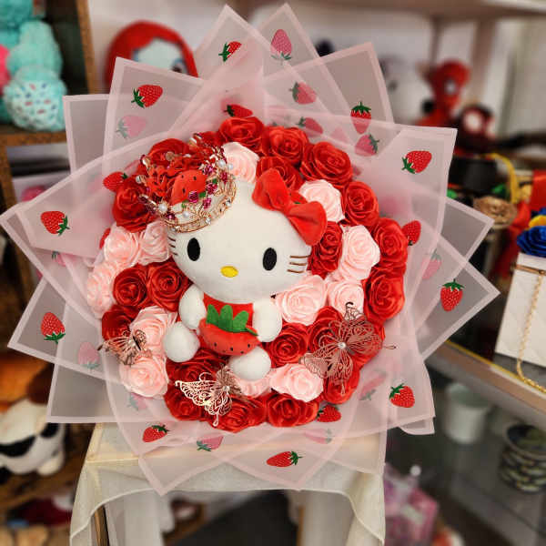 Hello Kitty plush bouquet with red and pink roses and strawberry wrap
