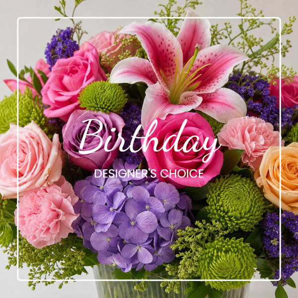 Pink and purple mixed bouquet with lilies, roses, carnations, and hydrangea