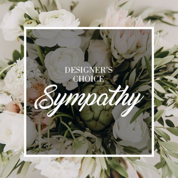 White sympathy bouquet with mixed blooms and greenery