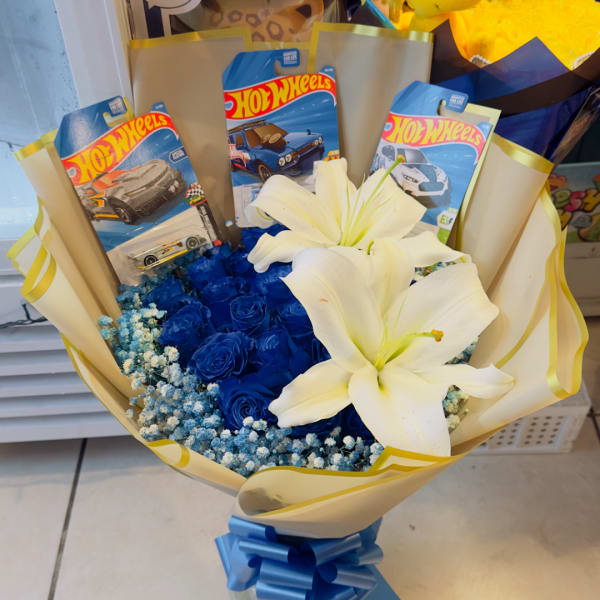 Bouquet of blue roses and white lilies with Hot Wheels toy packages