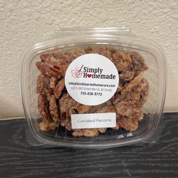 Container of candied pecans with a label
