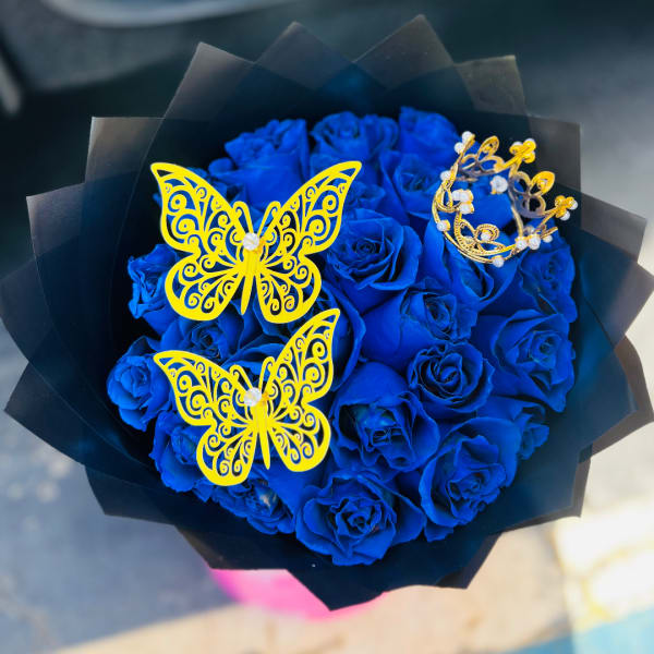 Bouquet of blue roses with yellow butterfly decorations