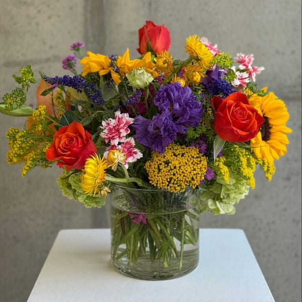 Colorful mixed bouquet in a clear glass vase