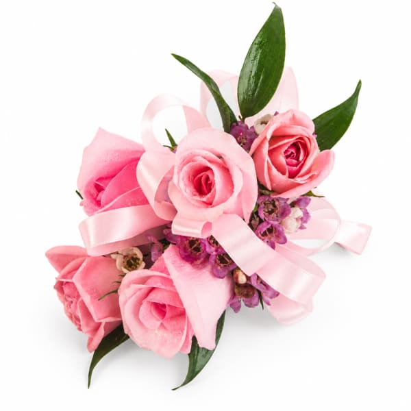 Pink rose corsage with ribbon and small purple accents