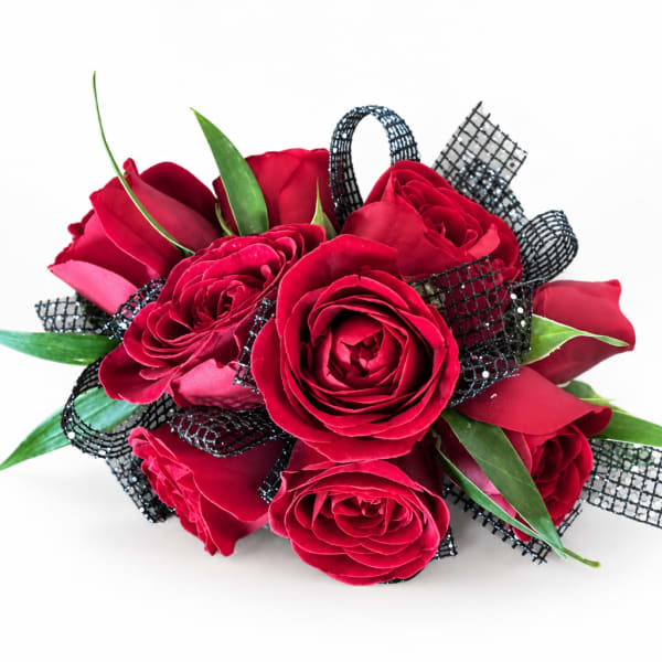 Red rose bouquet with black ribbon accents on a white background