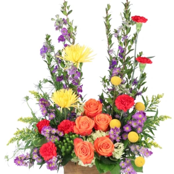 Colorful floral arrangement with orange roses, red carnations, and purple blooms