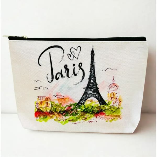 White pouch with a Paris Eiffel Tower design and the word Paris
