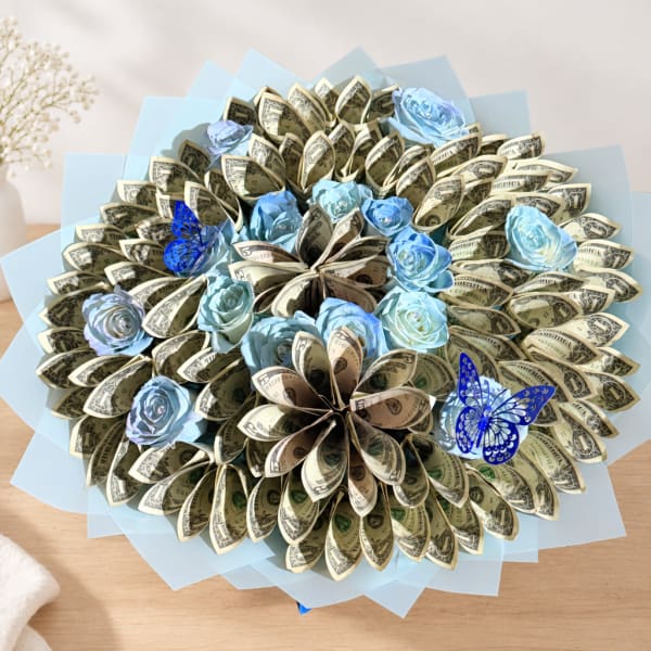 Bouquet made of folded dollar bills with blue paper roses and butterfly accents