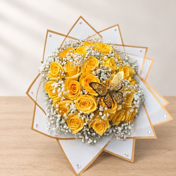Yellow rose bouquet with white baby's breath and clear-edged wrapping