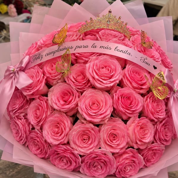 Pink rose bouquet with a tiara and birthday ribbon