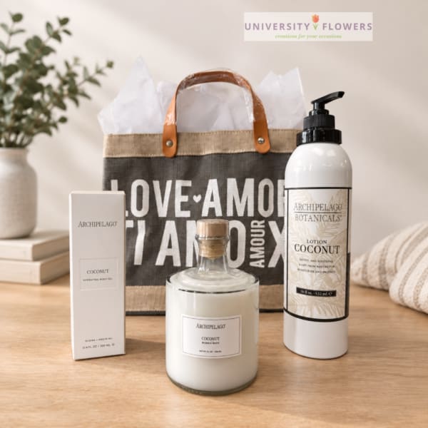 Coconut bath and body gift set with lotion, body oil, and candle