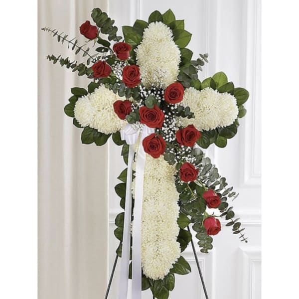 Cross-shaped floral standing spray with red roses and white mums