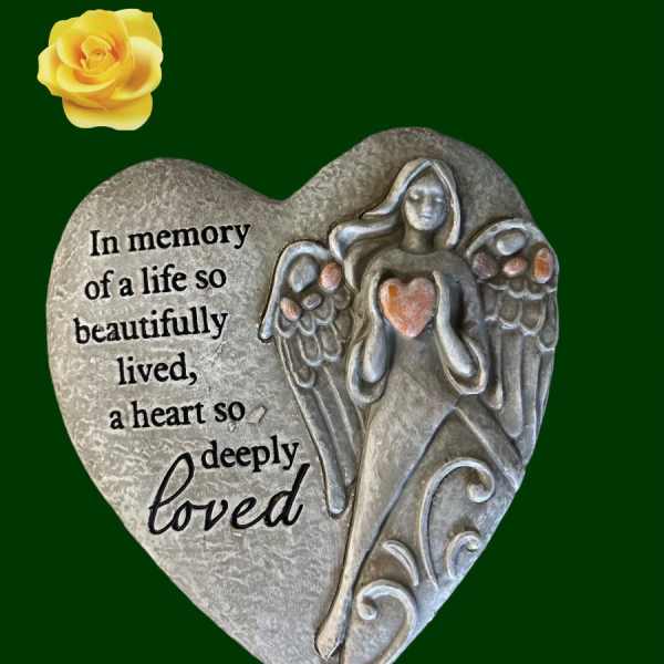 Heart-shaped memorial plaque with an angel and a yellow rose