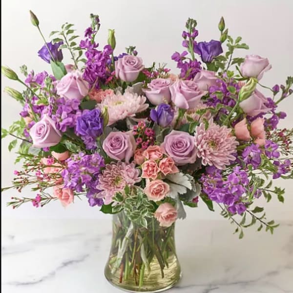 Lavender and pink bouquet in a clear glass vase