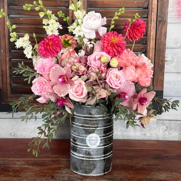 Pink and white mixed bouquet in a metal vase