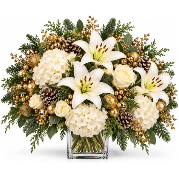 White lilies and roses in a glass vase with gold ornaments and pinecones