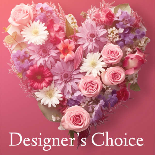 Heart-shaped bouquet of pink and purple flowers on a pink background