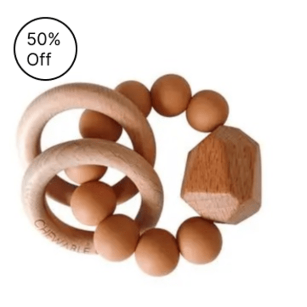 Wooden teething toy with rings and beads on a white background