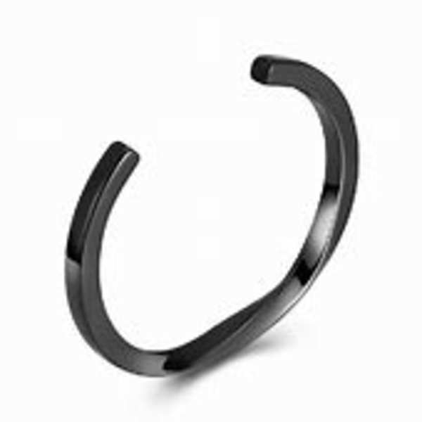 Black open cuff bracelet on a white background