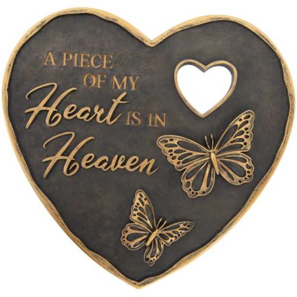 Heart-shaped memorial plaque with butterflies and the words "A piece of my heart is in Heaven"