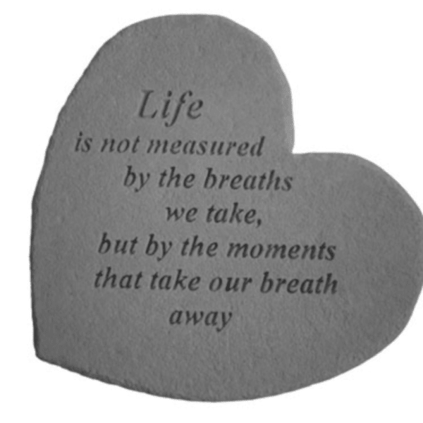 Heart-shaped memorial plaque with a printed quote