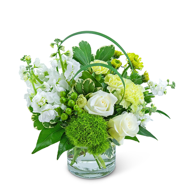 White and yellow floral arrangement in a glass vase
