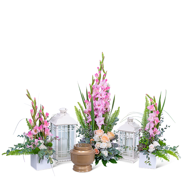 Pink floral sprays with white lanterns and a bronze urn
