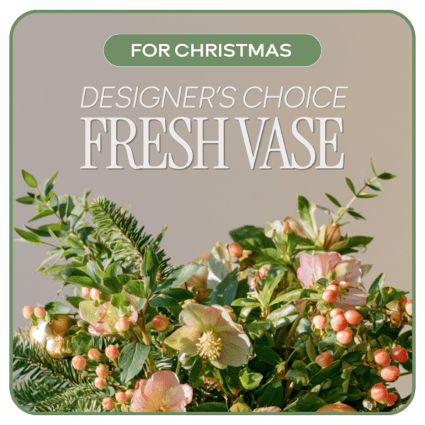 Fresh vase arrangement with pink and cream flowers and greenery