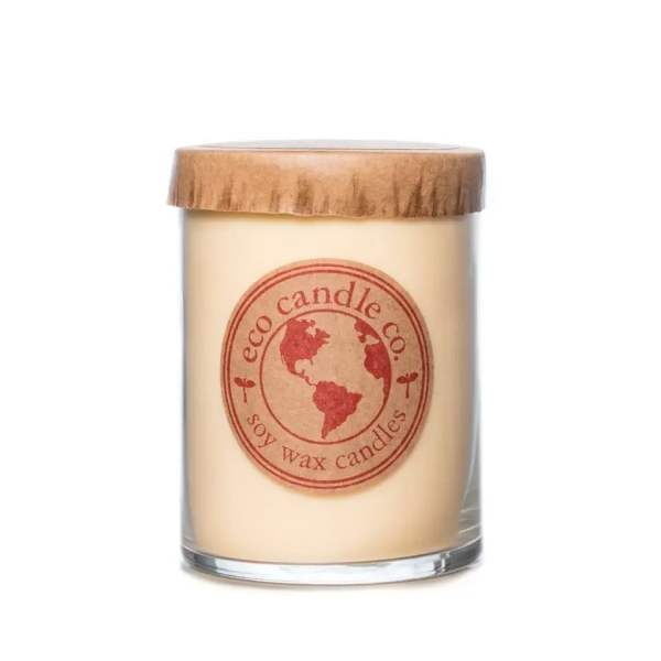 Soy wax candle in a glass jar with a wooden lid
