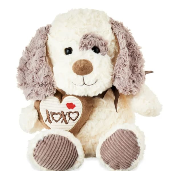 Plush dog holding a heart with XOXO embroidery
